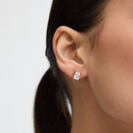 Gold emerald-cut solitaire stud earrings