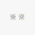 Pair of diamond stud earrings on a white background